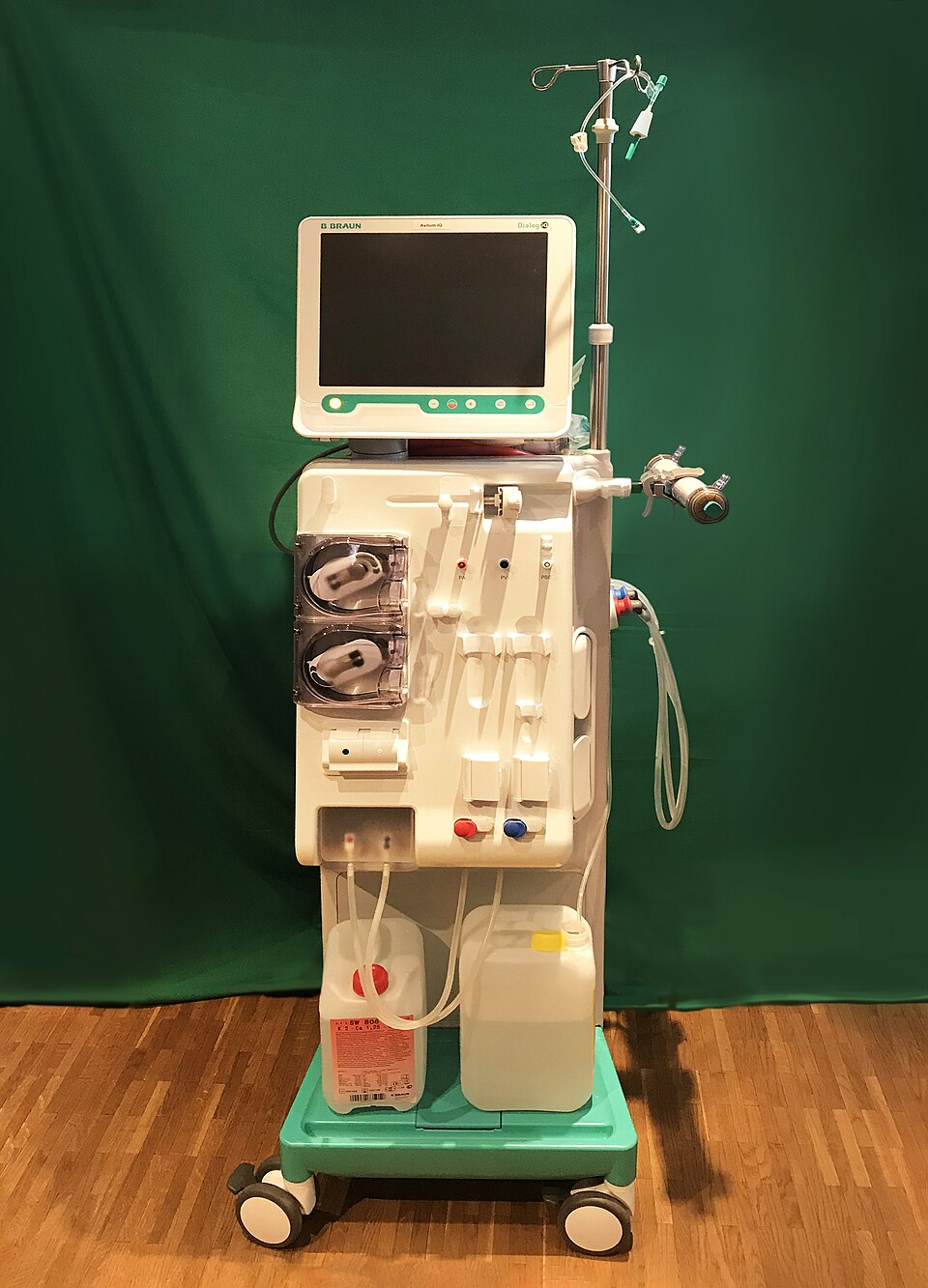 Dialysis machine with display and fluid-handling components